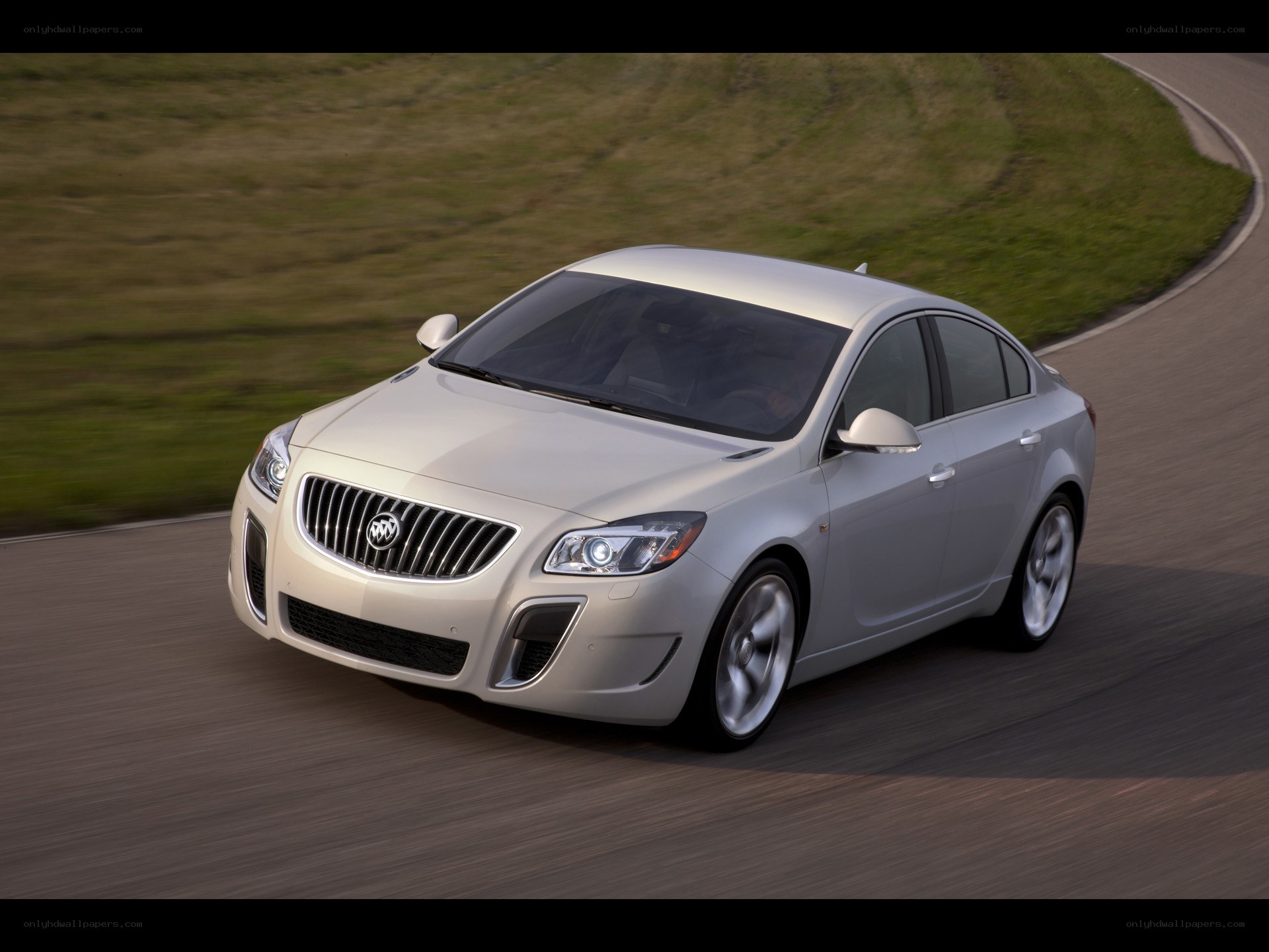 silver buick sedan on road