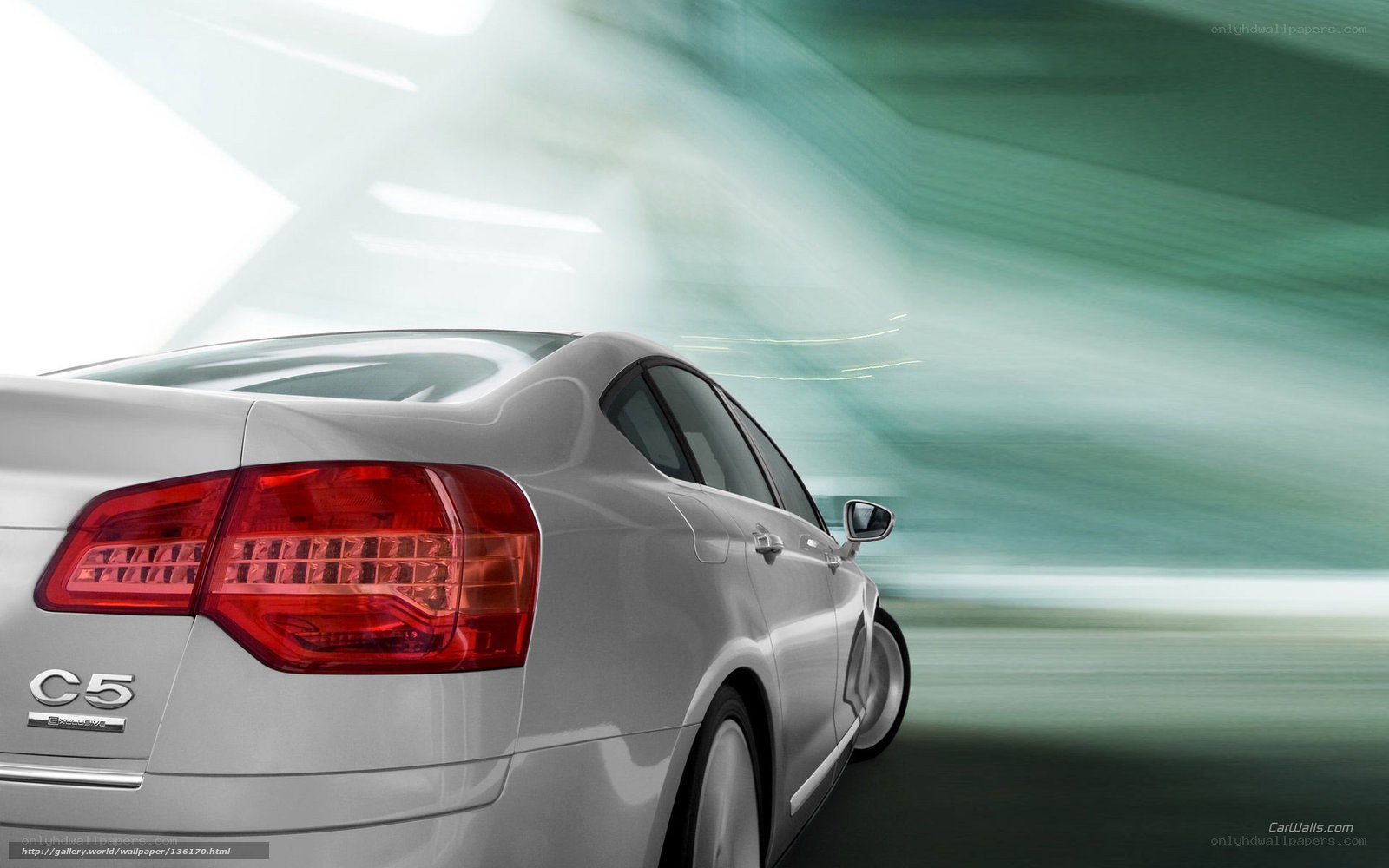 Silver C5 sedan in motion