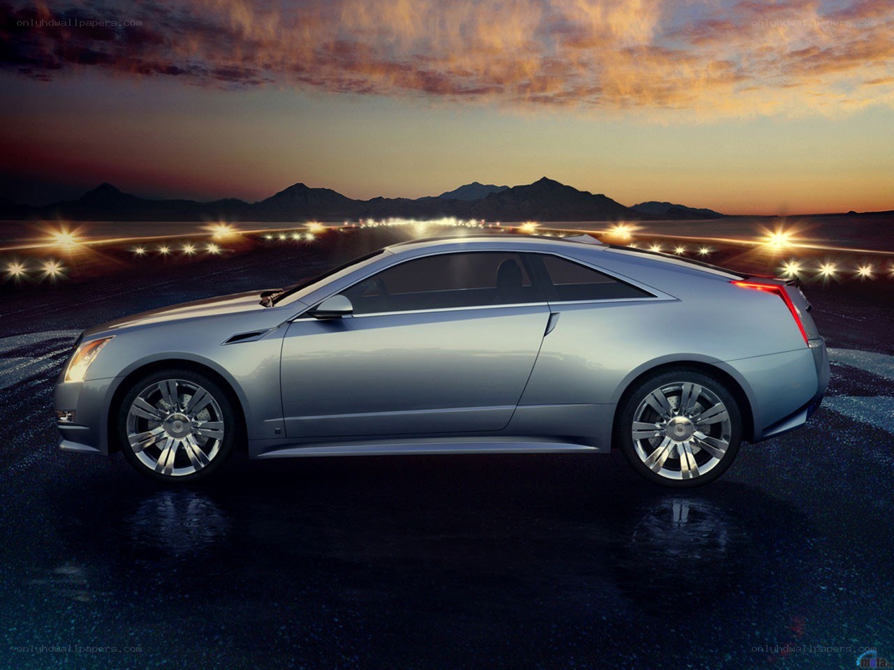 Silver Cadillac Coupe at Sunset