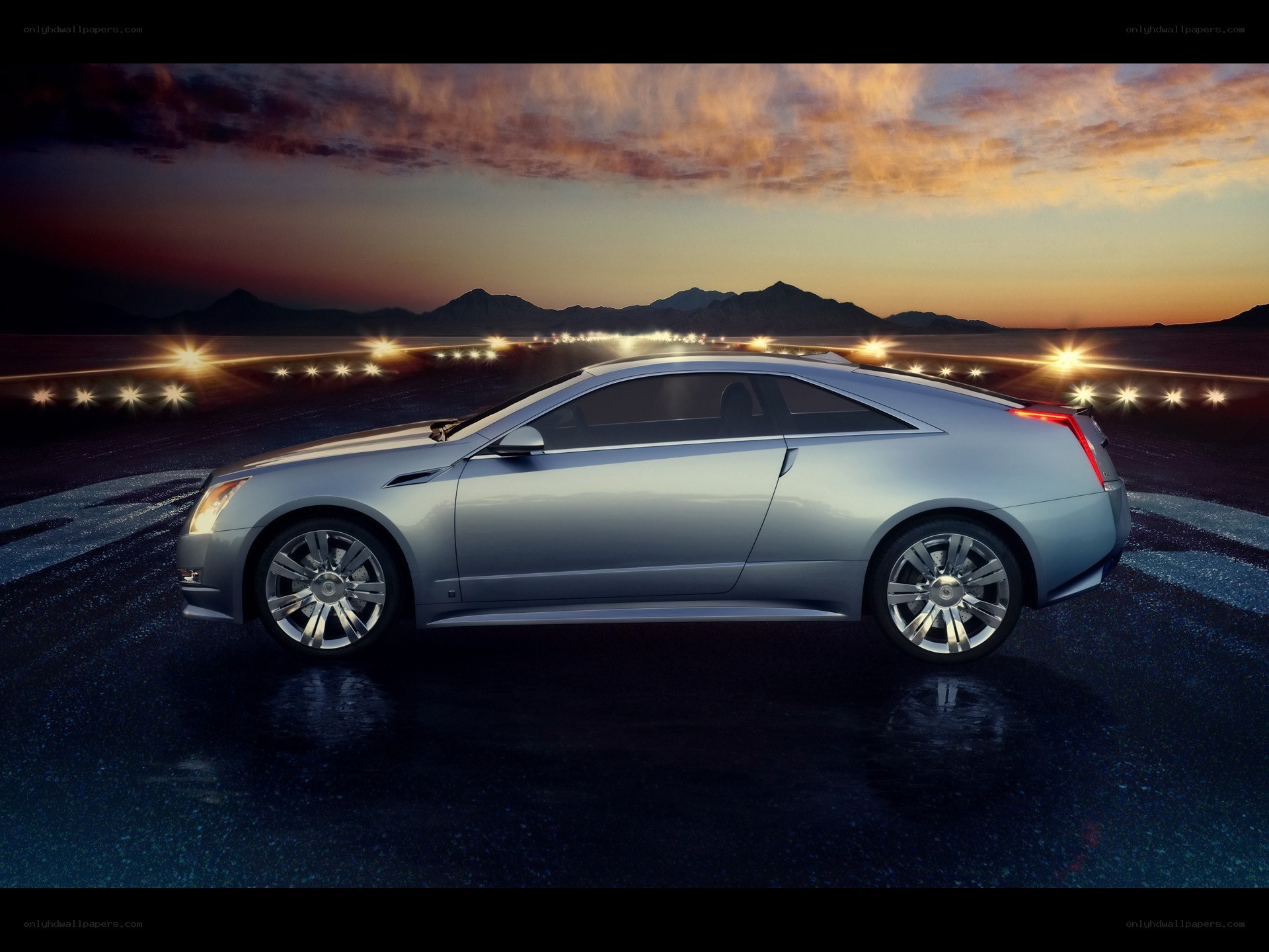 Silver Cadillac Coupe at Sunset