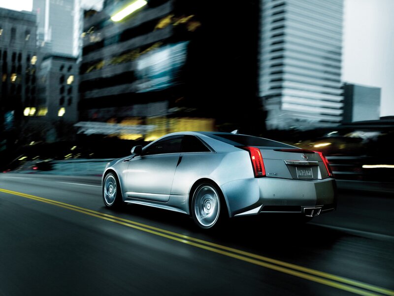 Silver Cadillac CTS Coupe in city