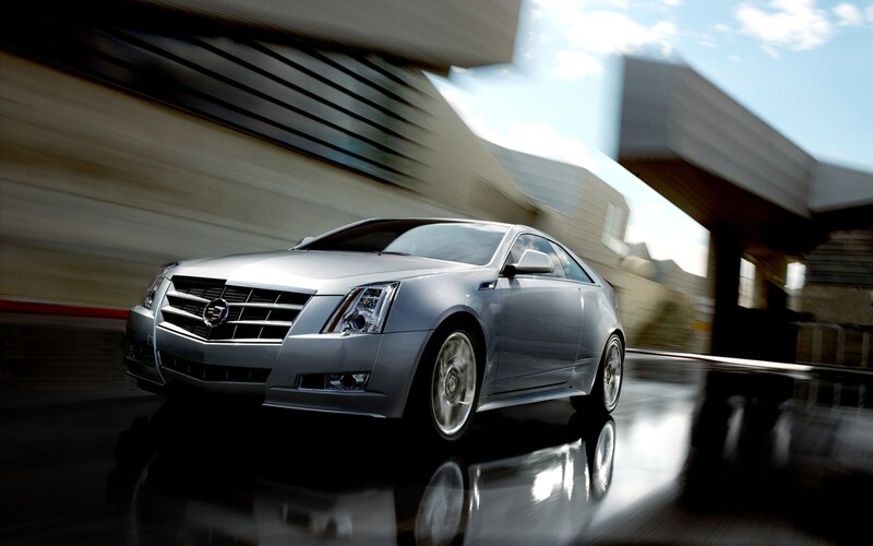 Silver Cadillac CTS Coupe in motion