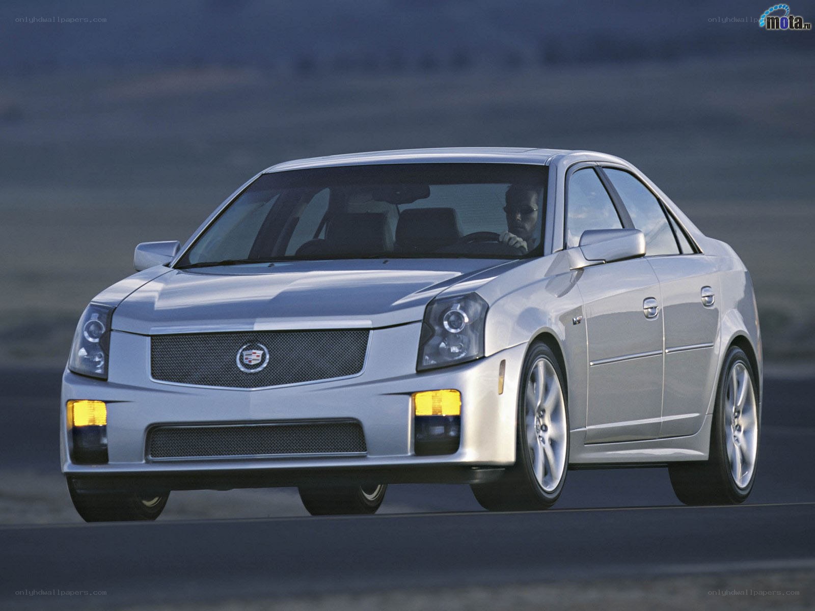 silver cadillac cts-v in motion