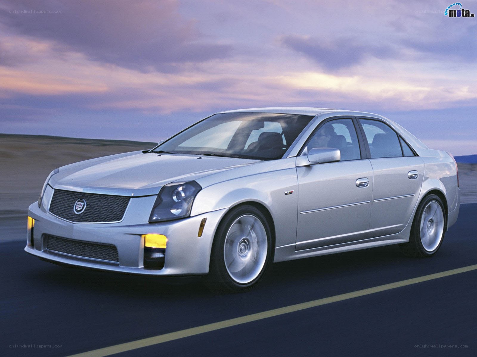 silver cadillac cts-v on road
