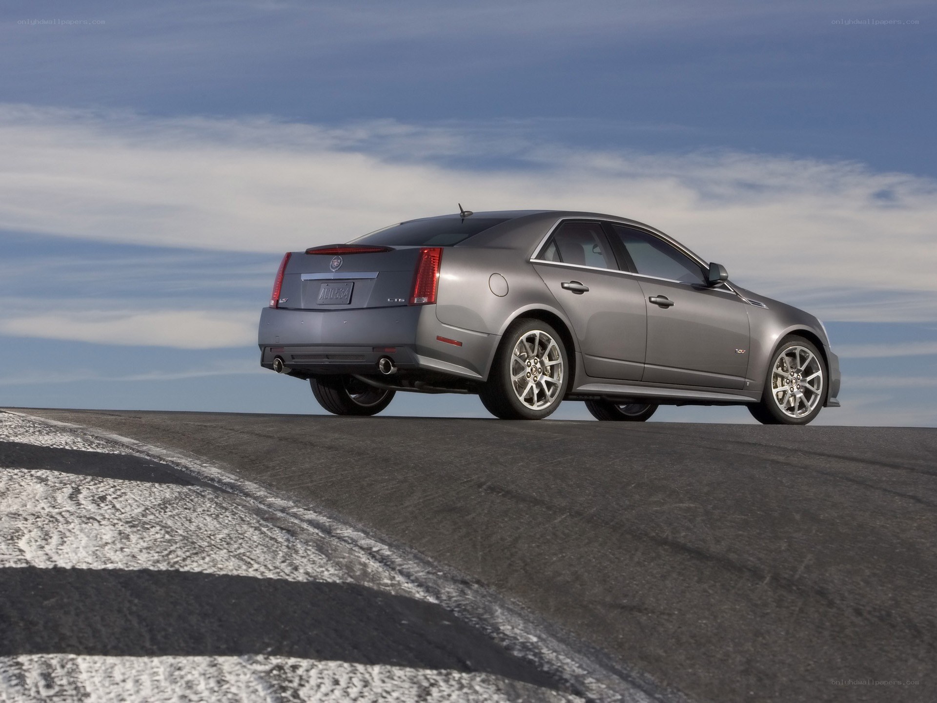 Silver Cadillac CTS-V on track