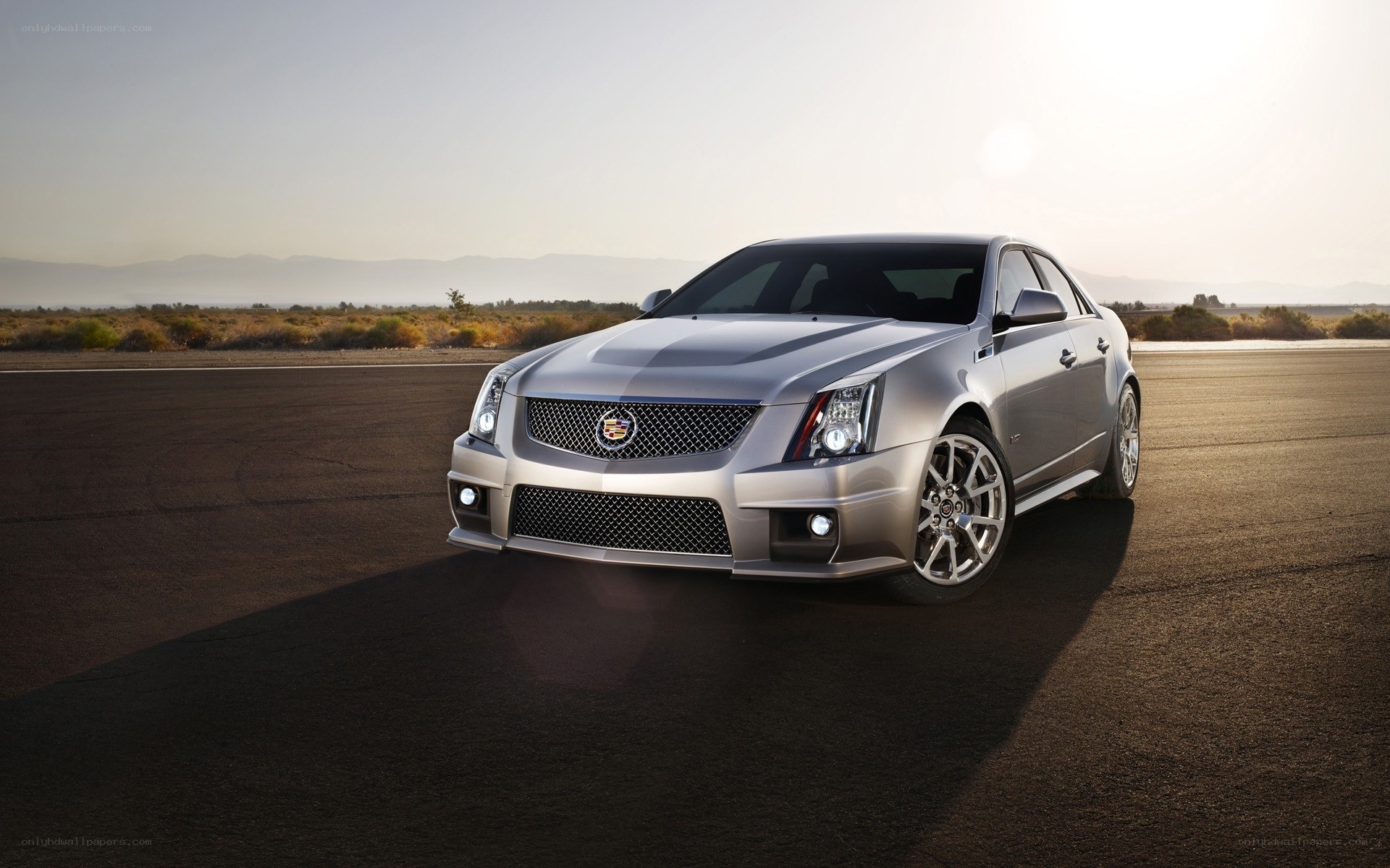 Silver Cadillac CTS-V on track