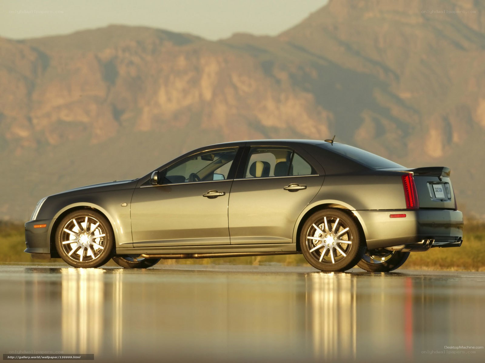 silver cadillac cts-v on wet road