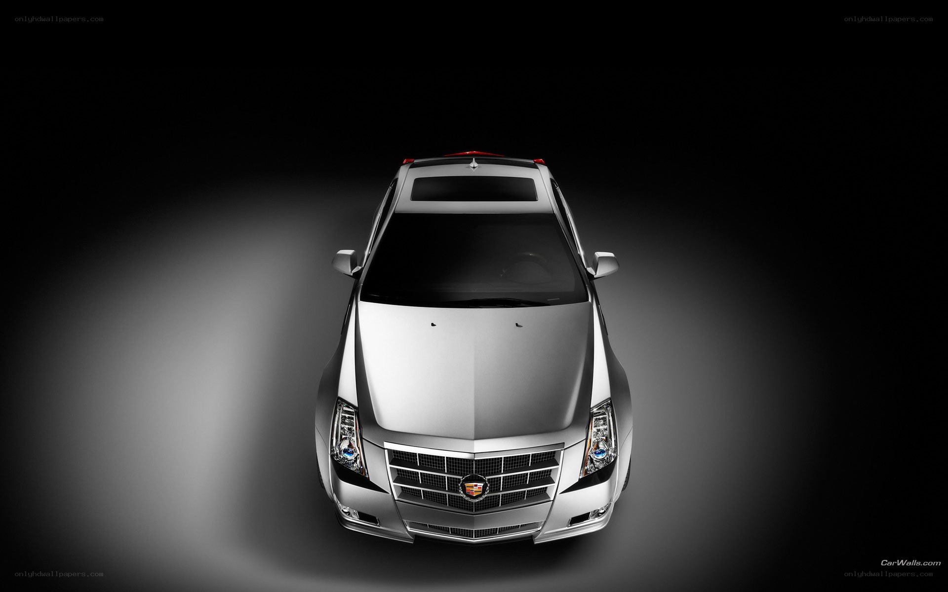silver cadillac from above