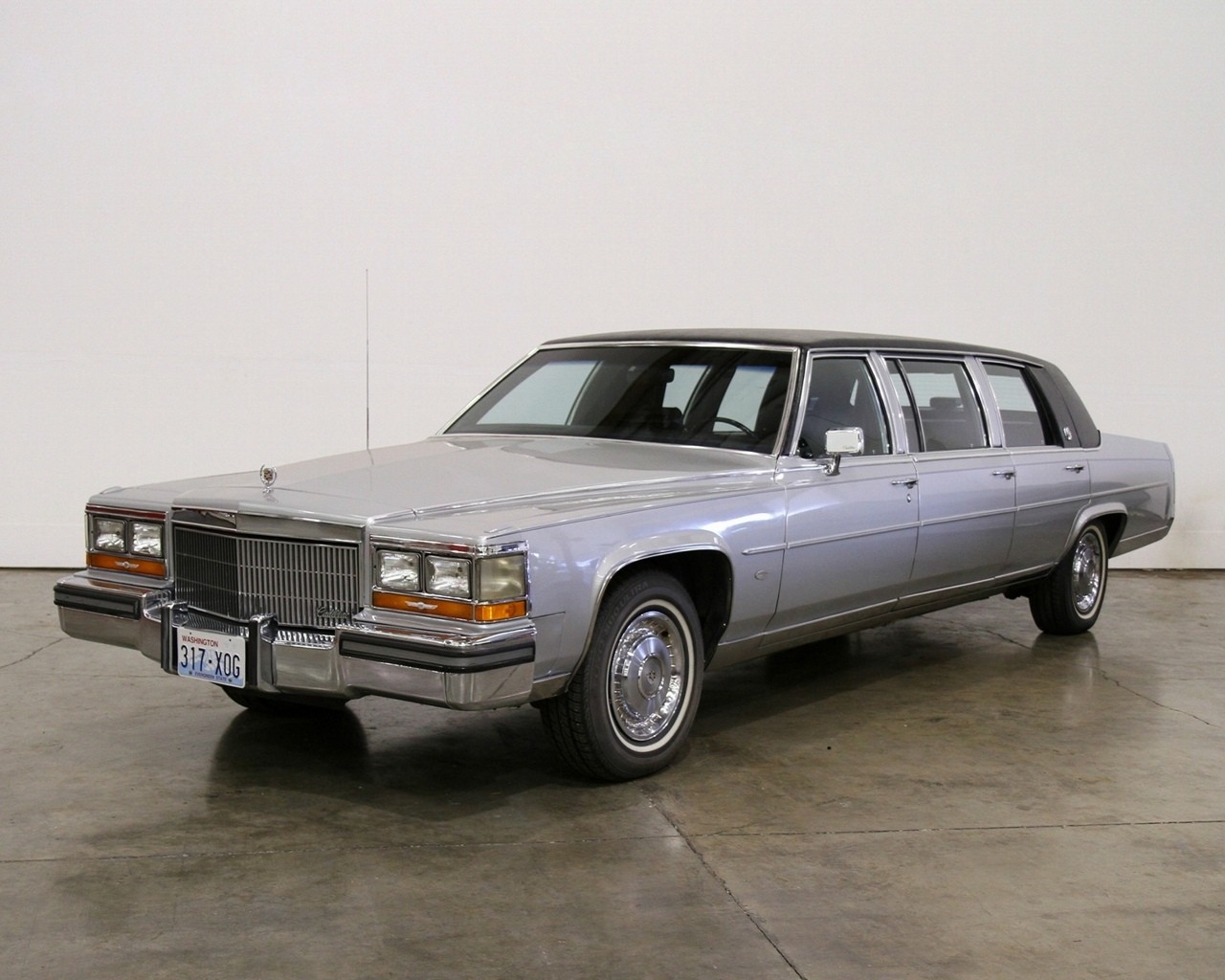 silver cadillac hearse