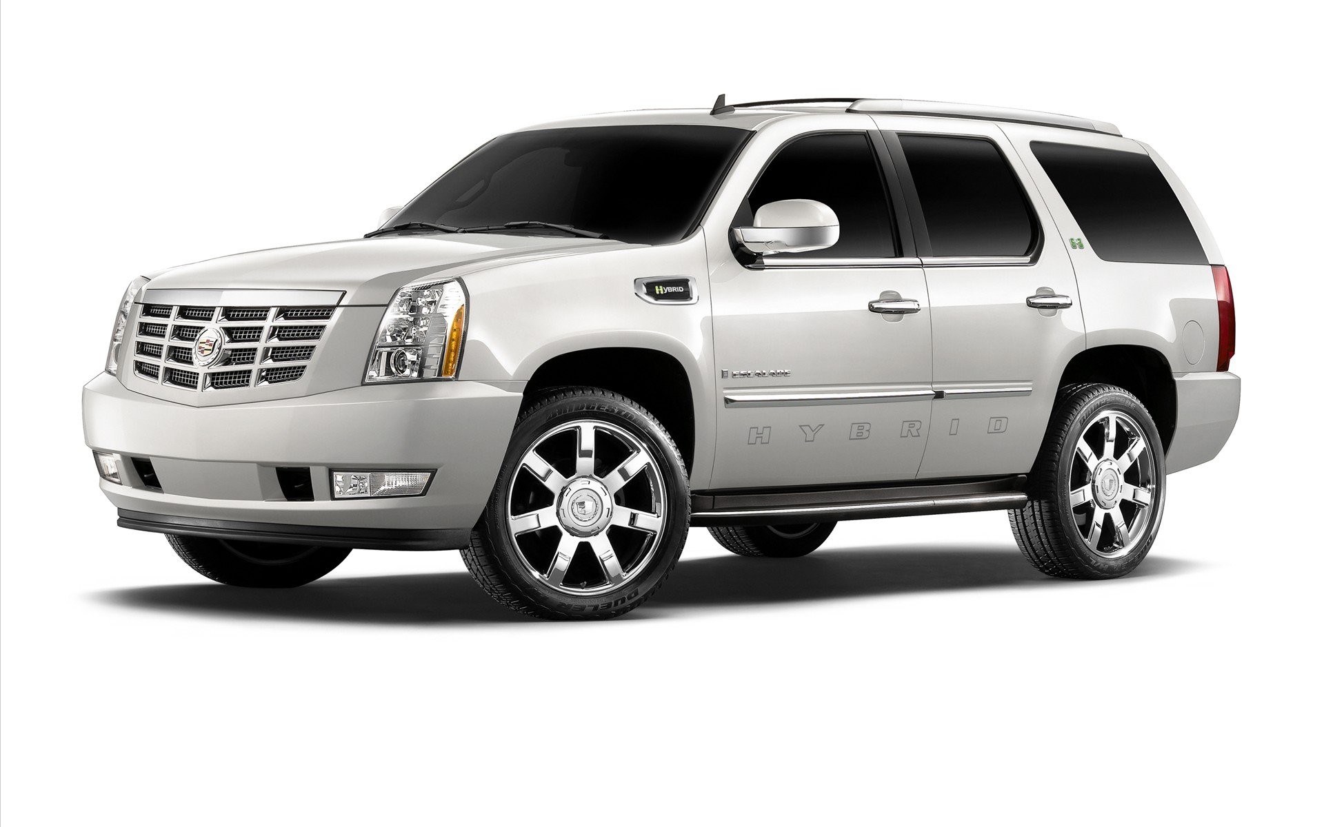 silver cadillac hybrid suv