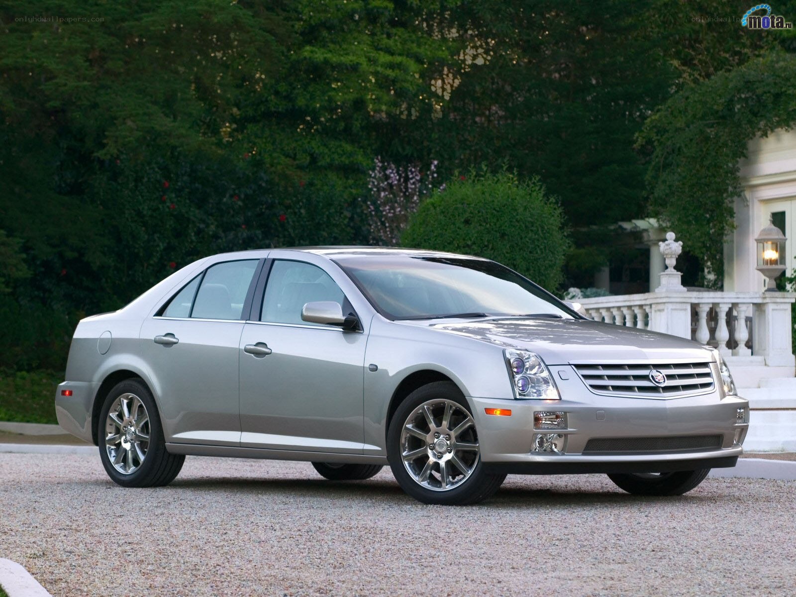 silver cadillac sedan