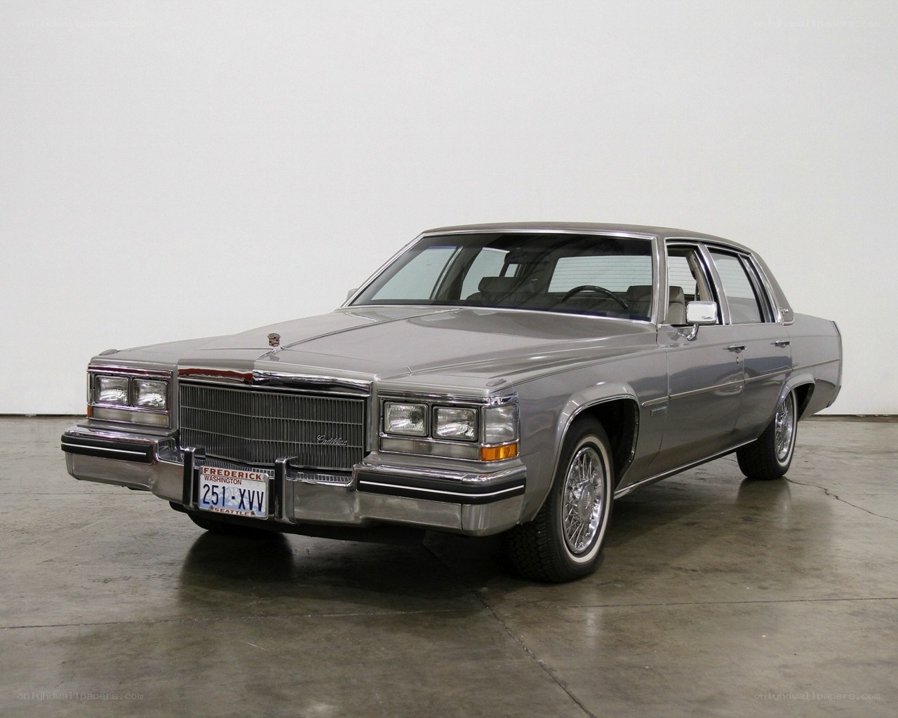 Silver Cadillac sedan