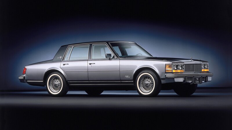 silver cadillac sedan