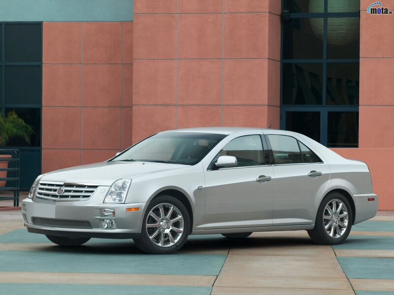 silver cadillac sedan