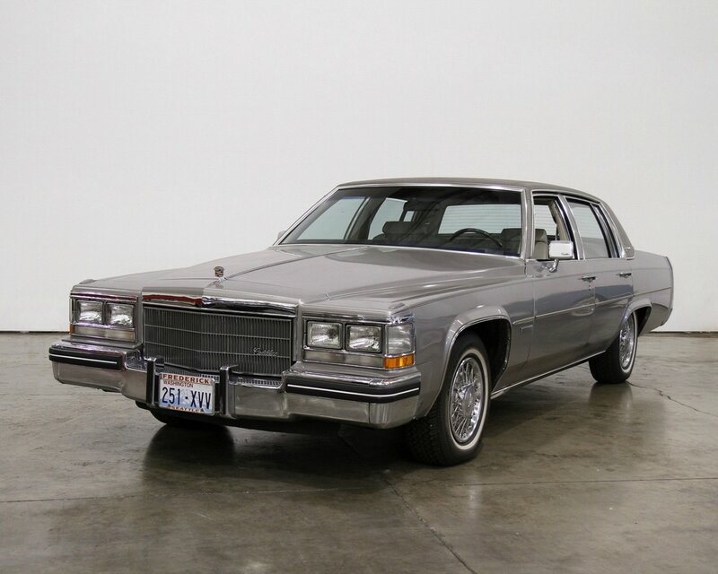 Silver Cadillac Sedan — Gray, Neutral