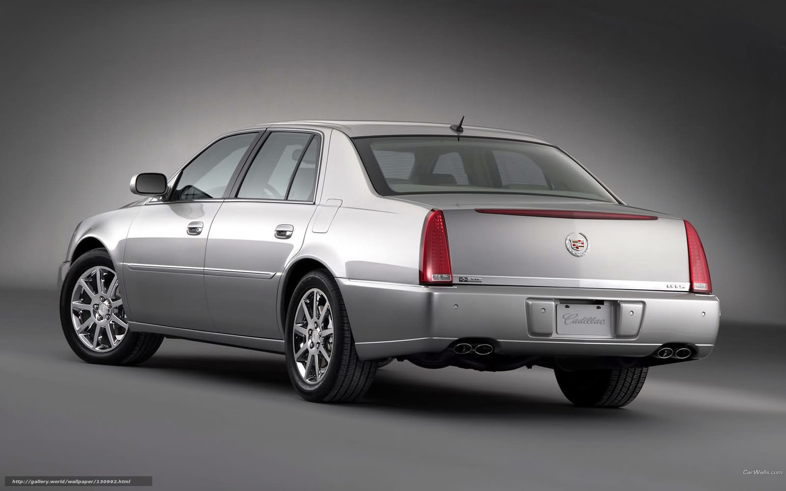 silver cadillac sedan