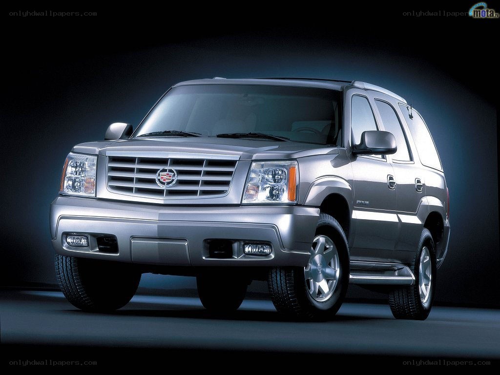 silver cadillac suv