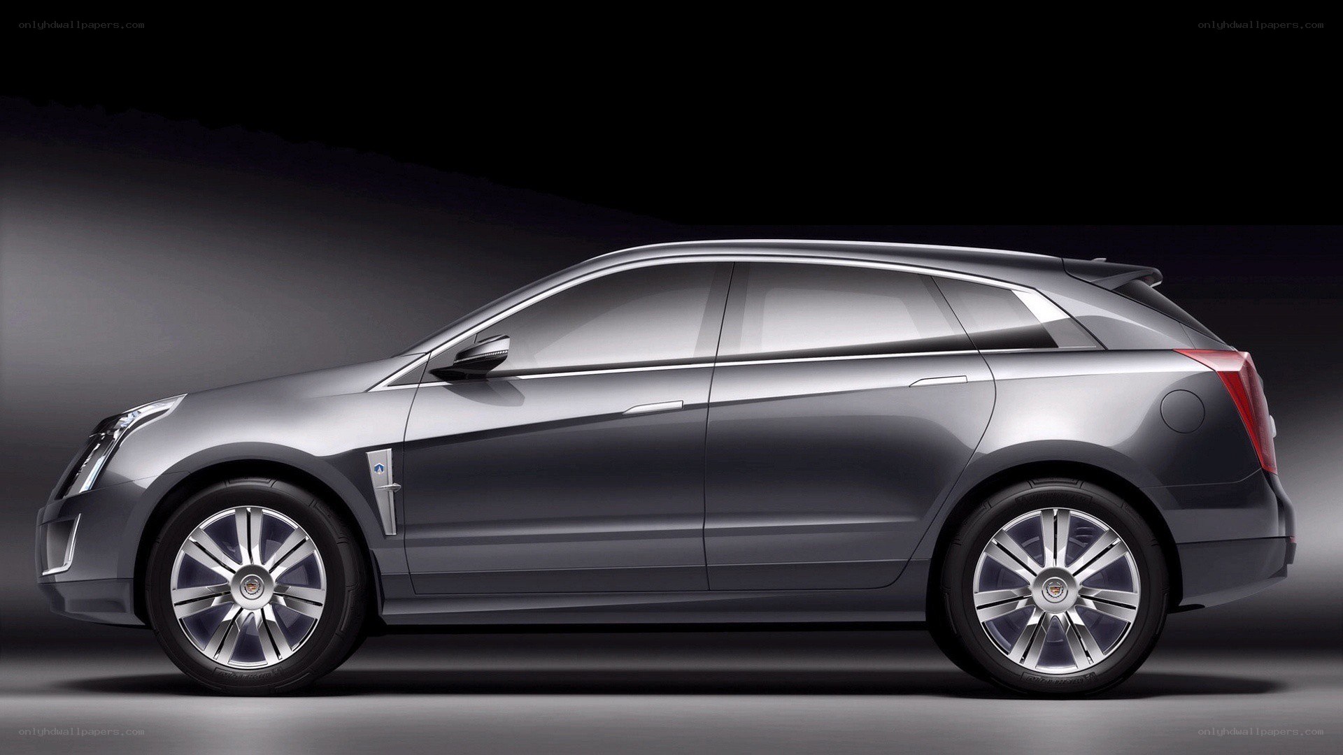 silver cadillac suv
