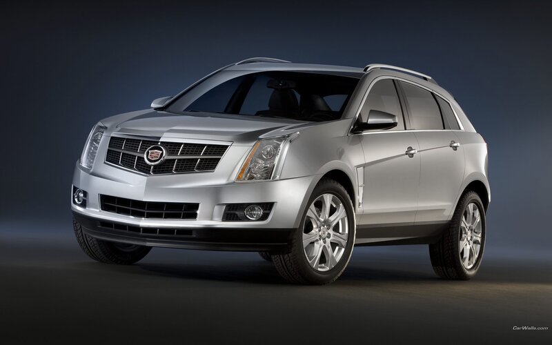 silver cadillac suv