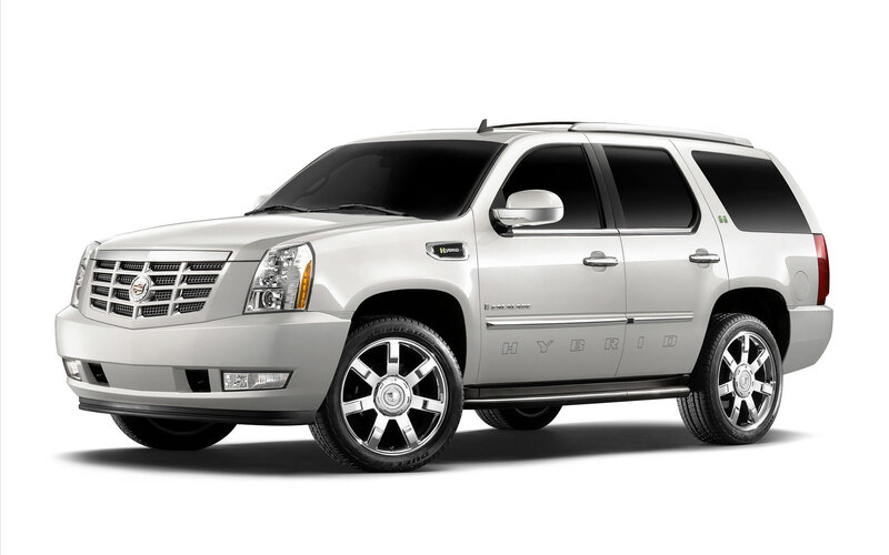 Silver Cadillac Suv — Black