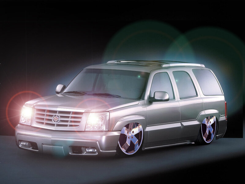 Silver Cadillac Suv — Dramatic