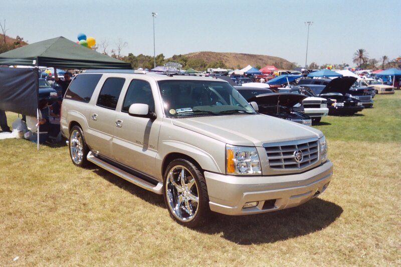 Silver Cadillac Suv — Outdoor