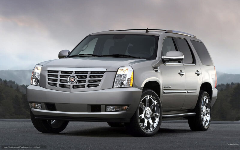 silver cadillac suv