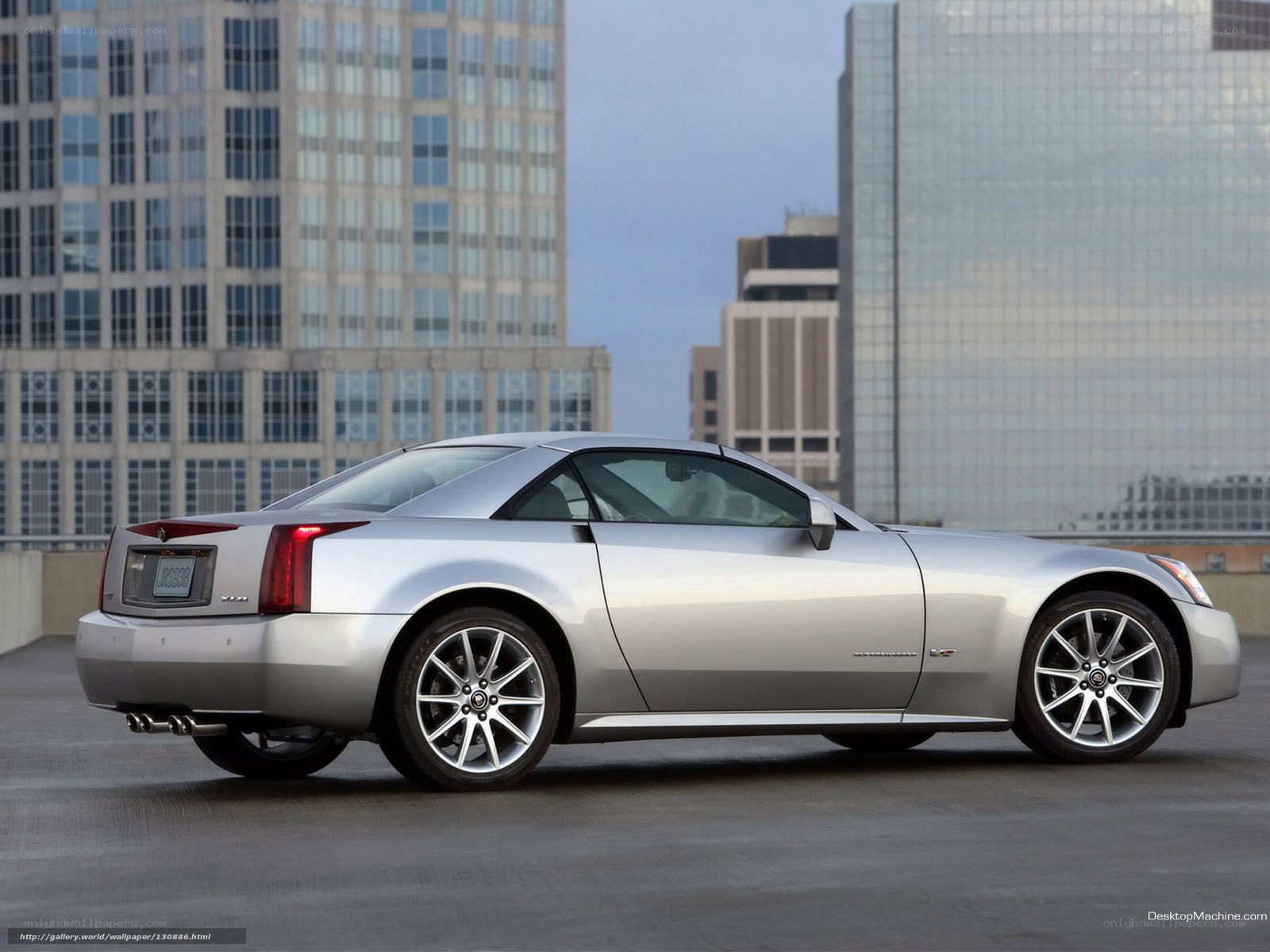 silver cadillac xlr in city