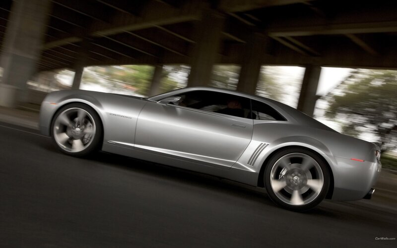 Silver Camaro in motion