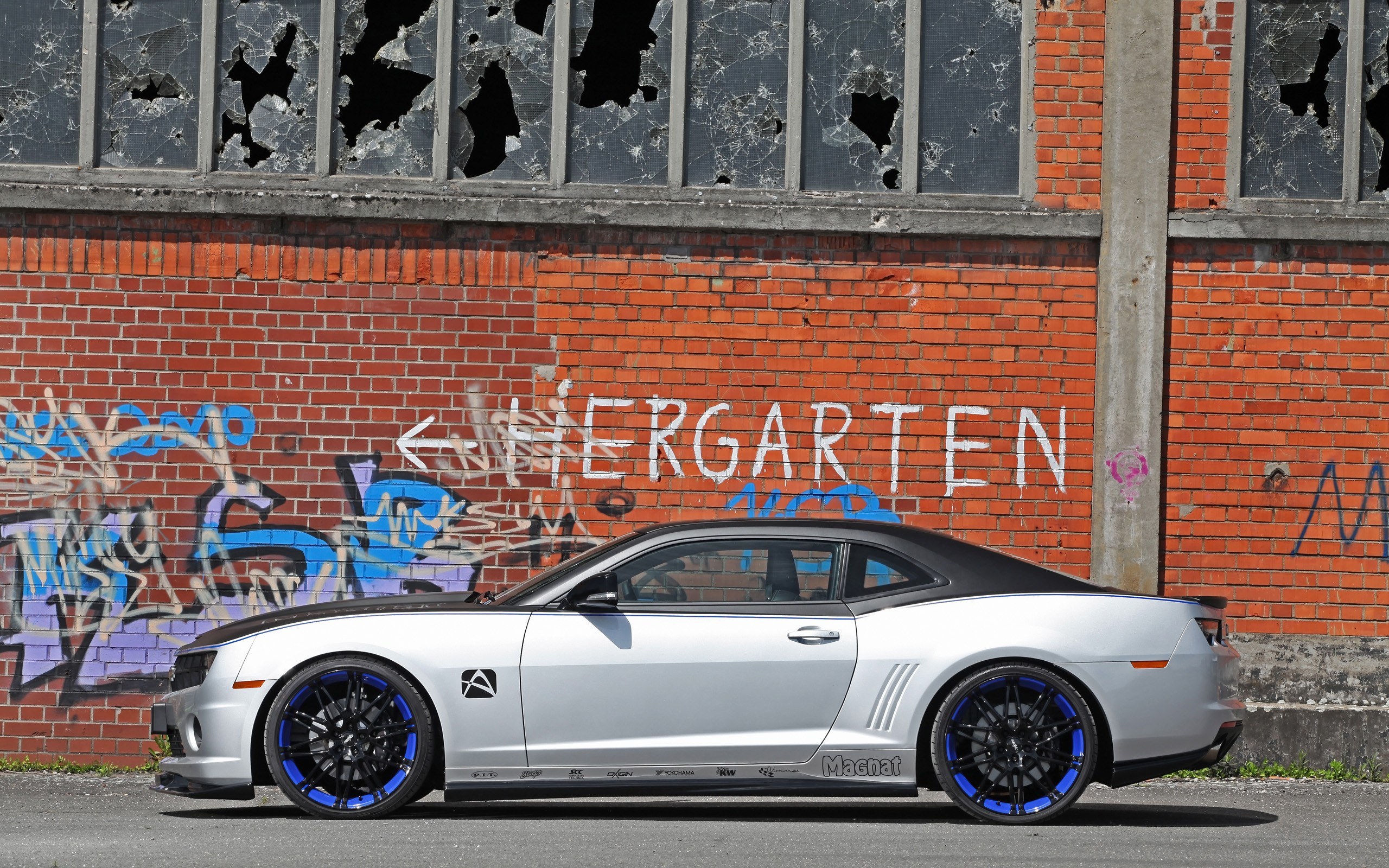 Silver Camaro in urban setting