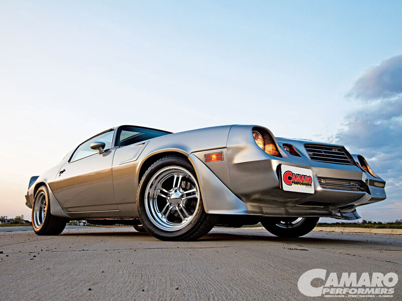 Silver Camaro on pavement