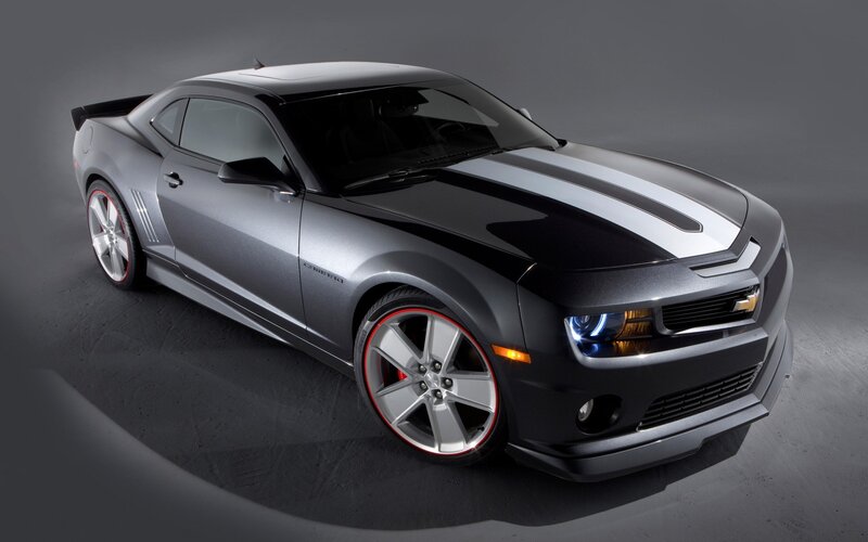 Silver Camaro with racing stripes