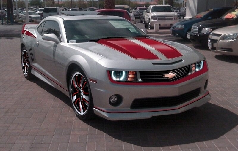 silver camaro with red stripes
