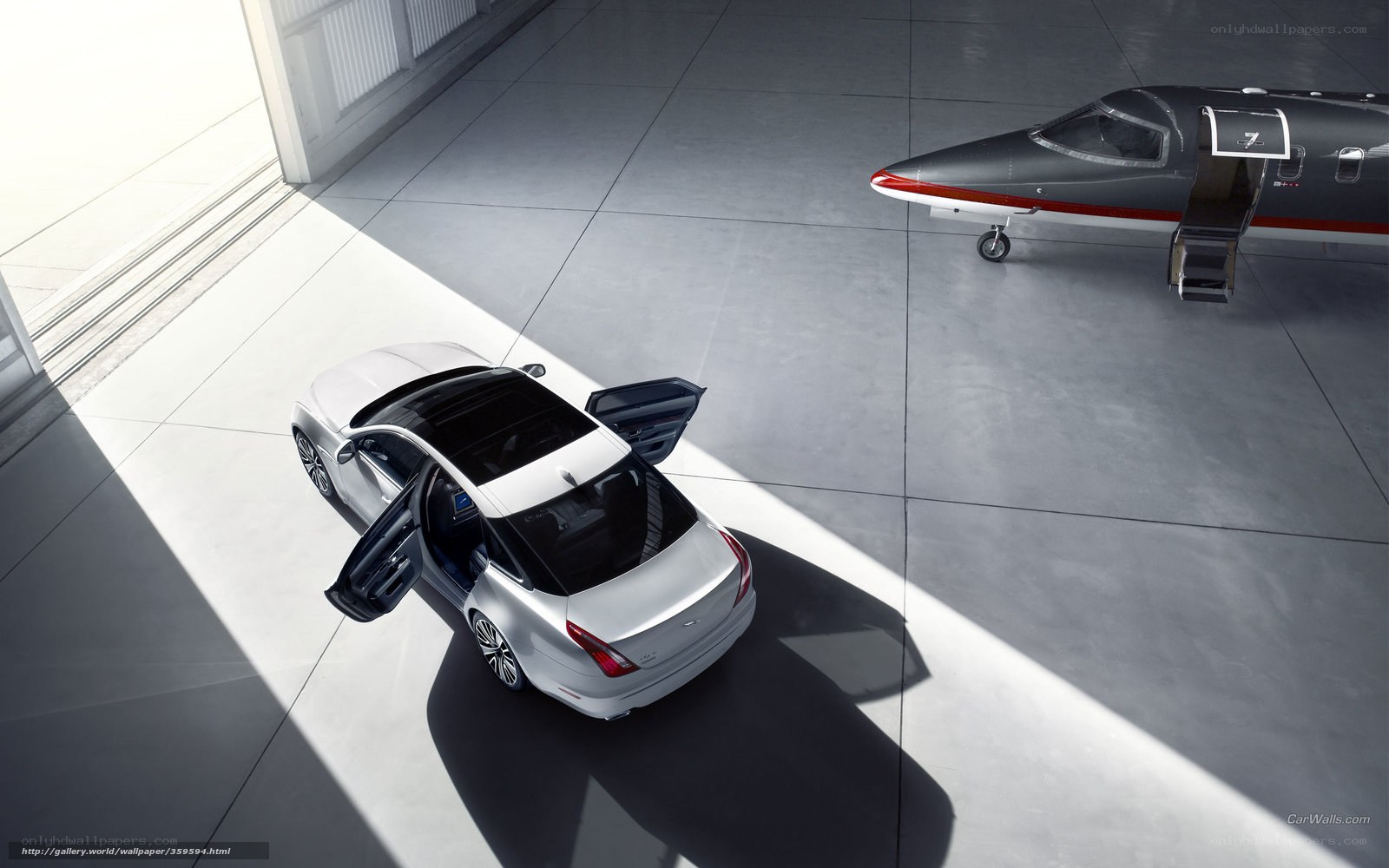 silver car and private jet