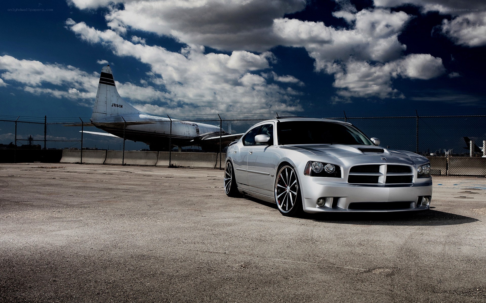 Silver car at airfield