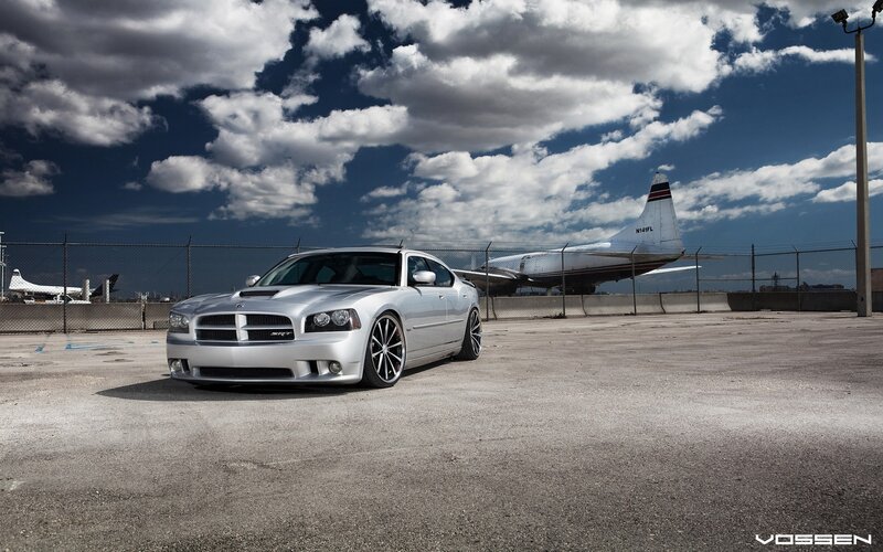 Silver car at airport tarmac