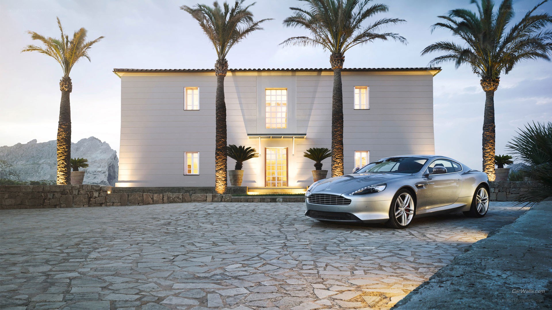 Silver car at luxury villa