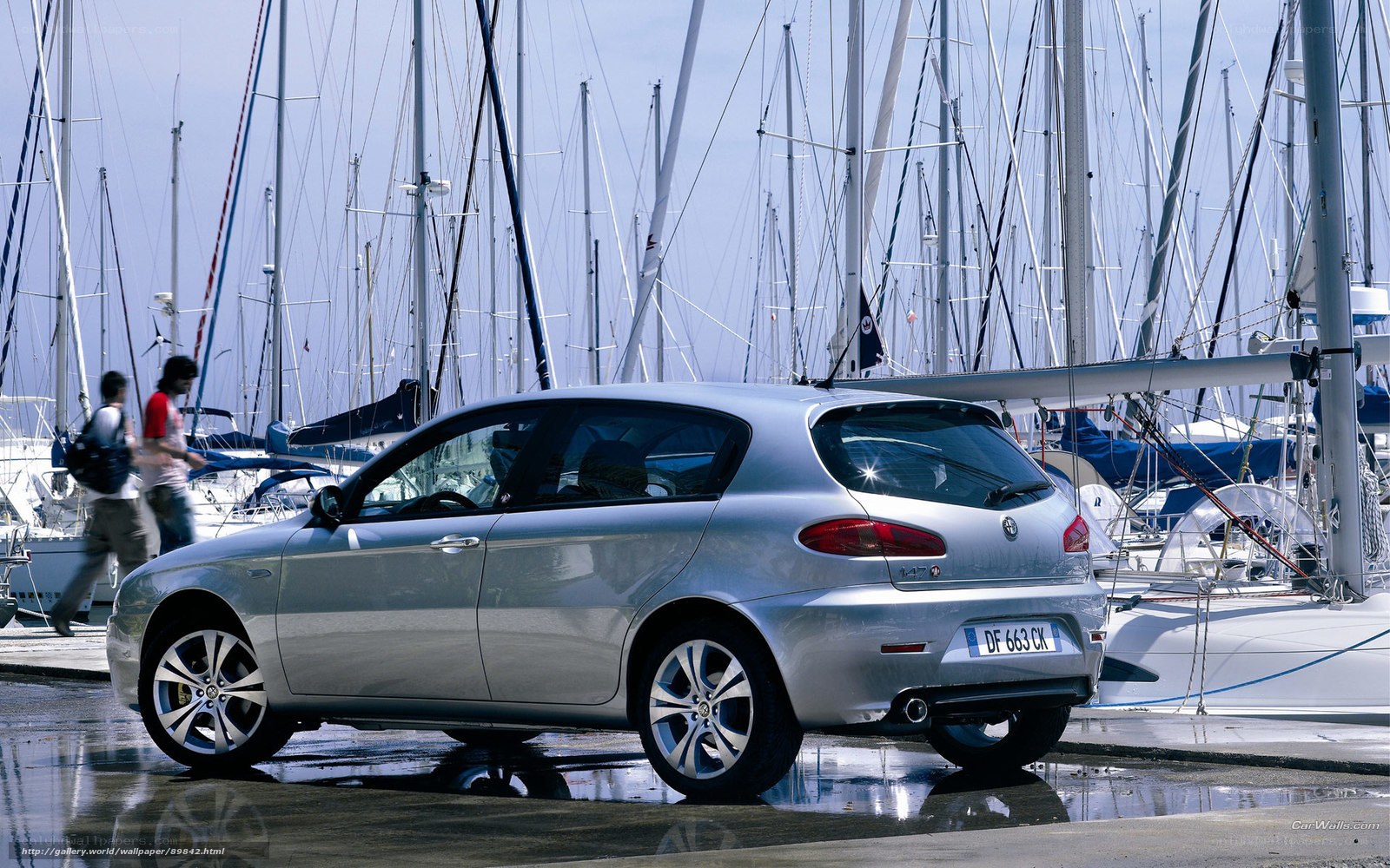 Silver car at marina