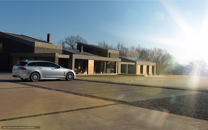 Silver car at modern house