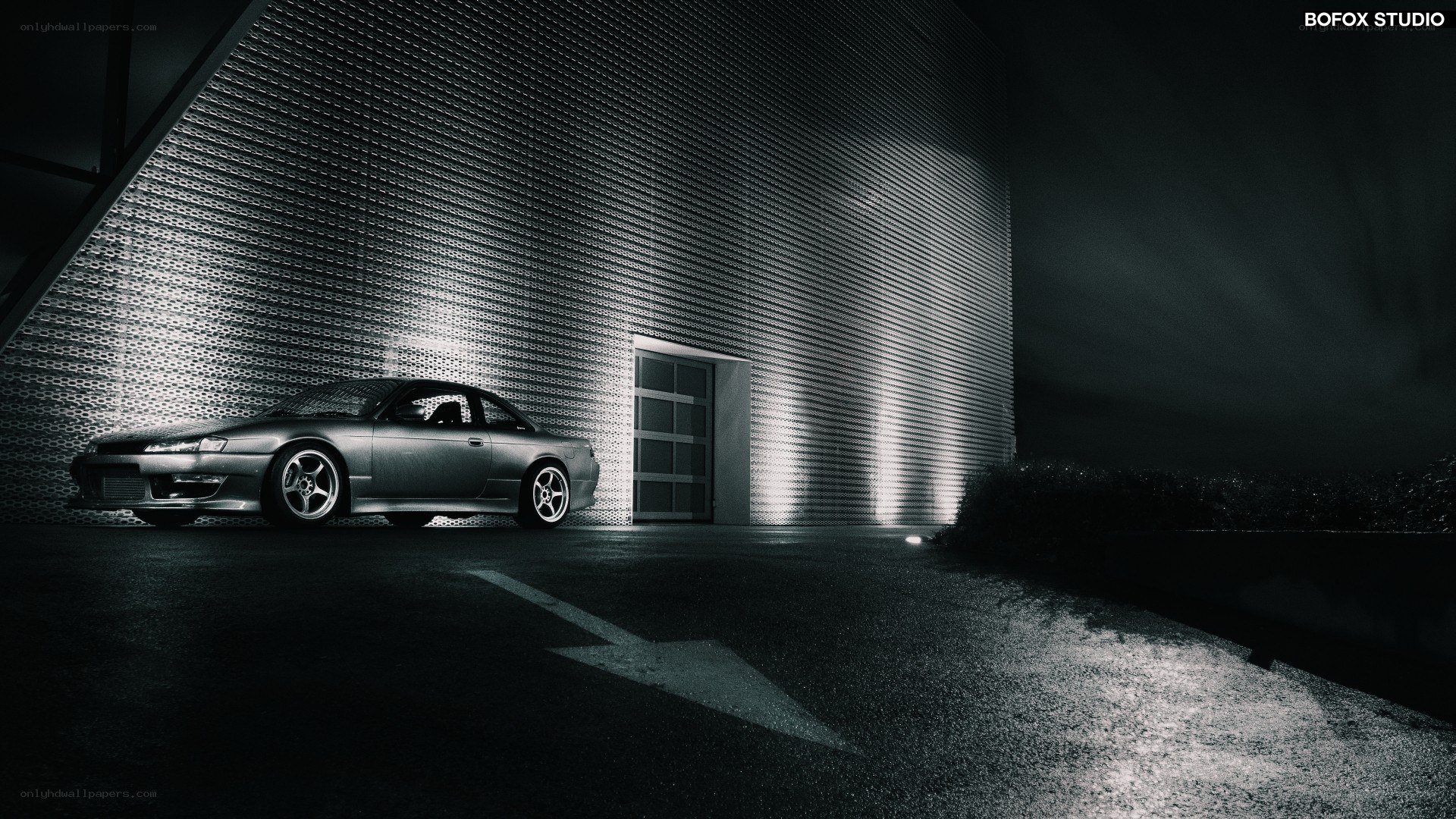 Silver car at night