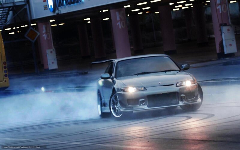 silver car drifting at night