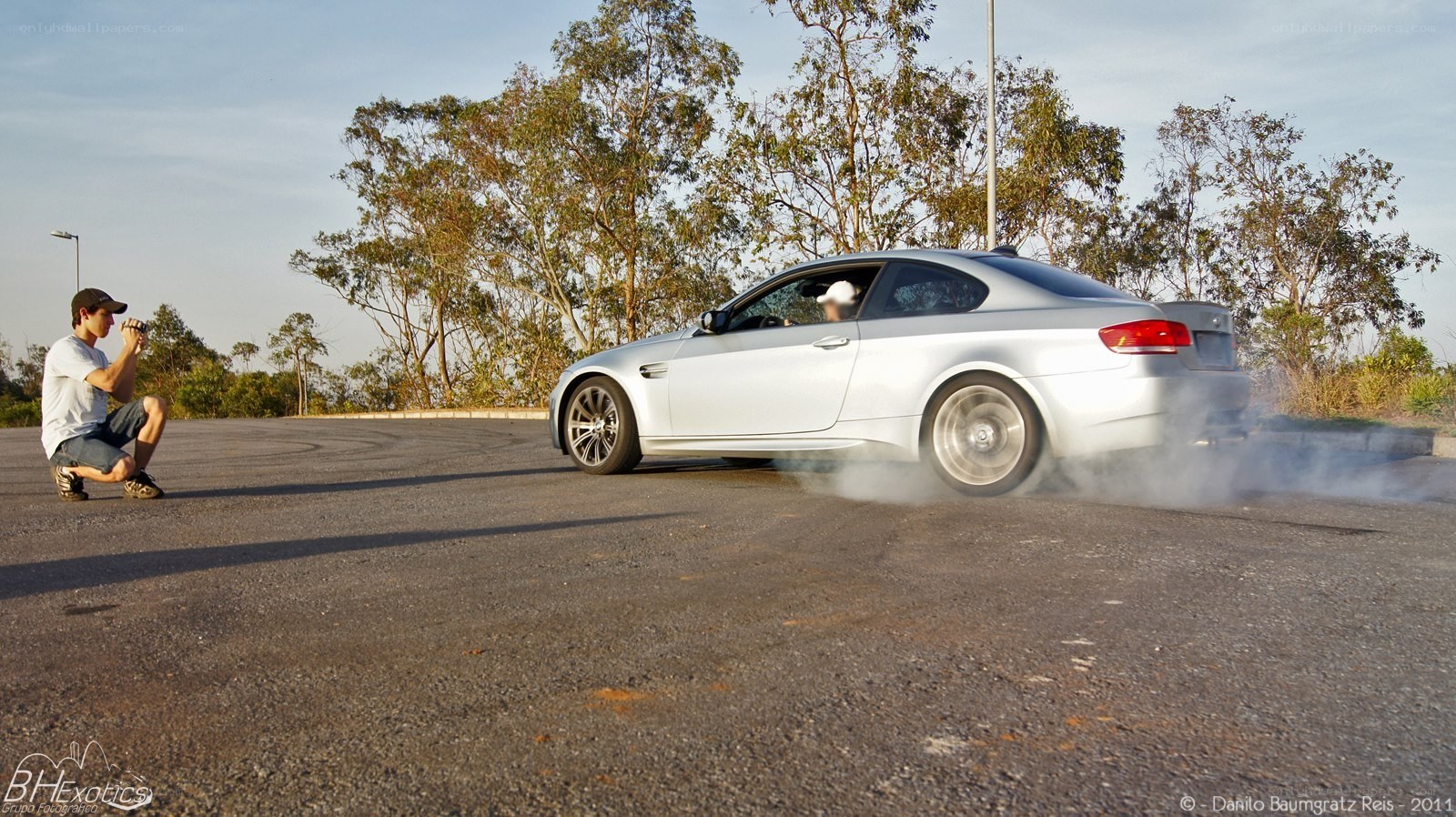 Silver car drifting on track