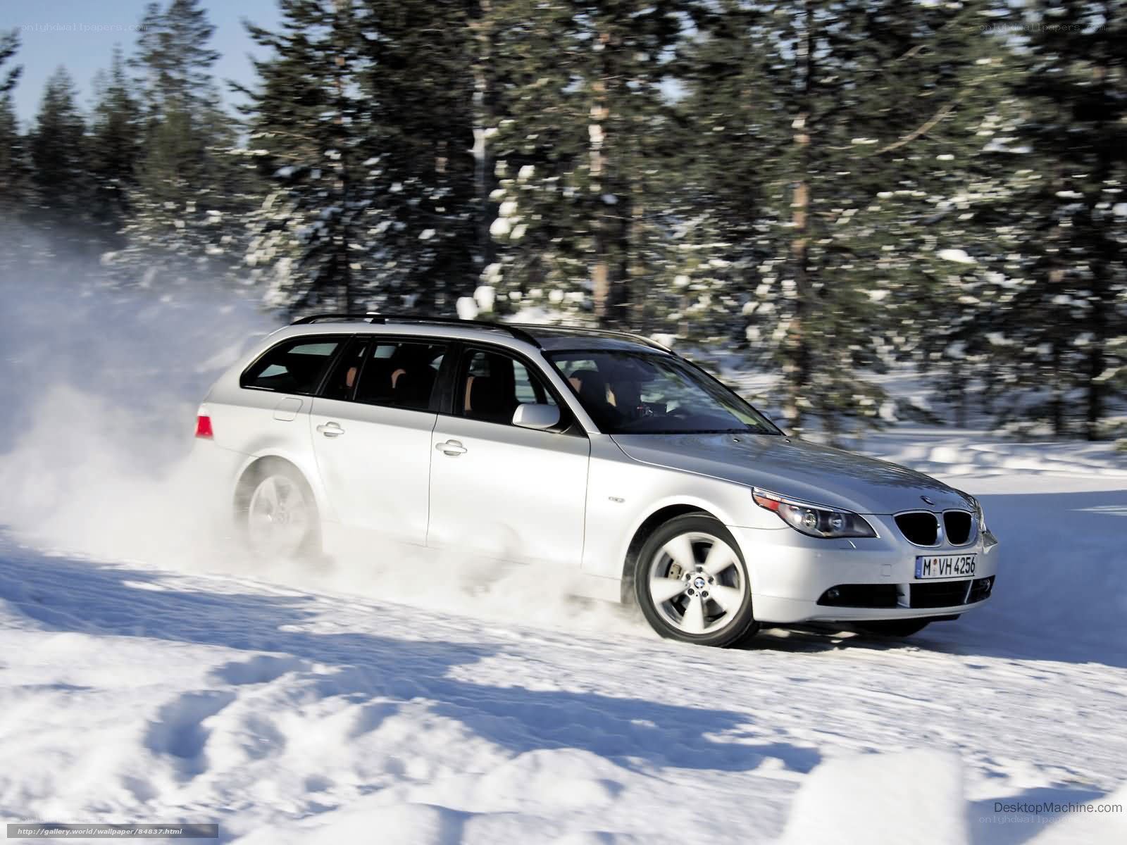 silver car driving in snow