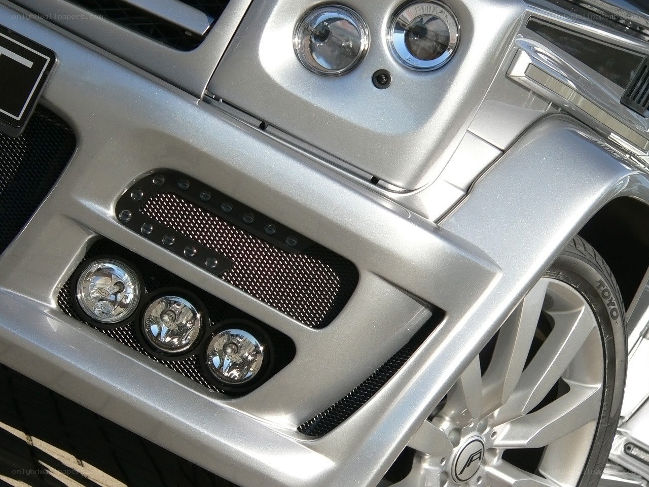silver car front bumper