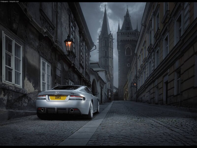 Silver car in a historic alley