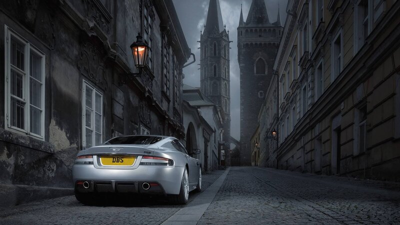 Silver car in a narrow alley