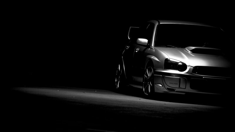 silver car in dark setting