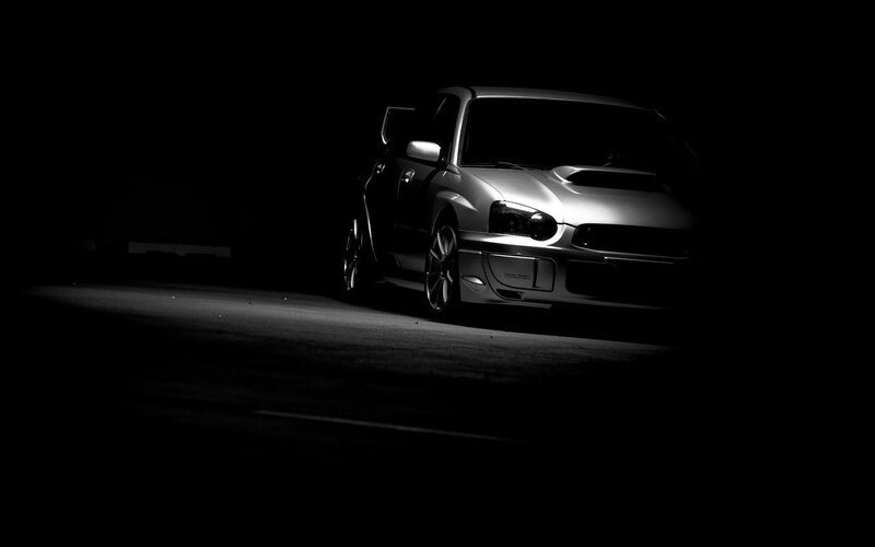 silver car in dark setting