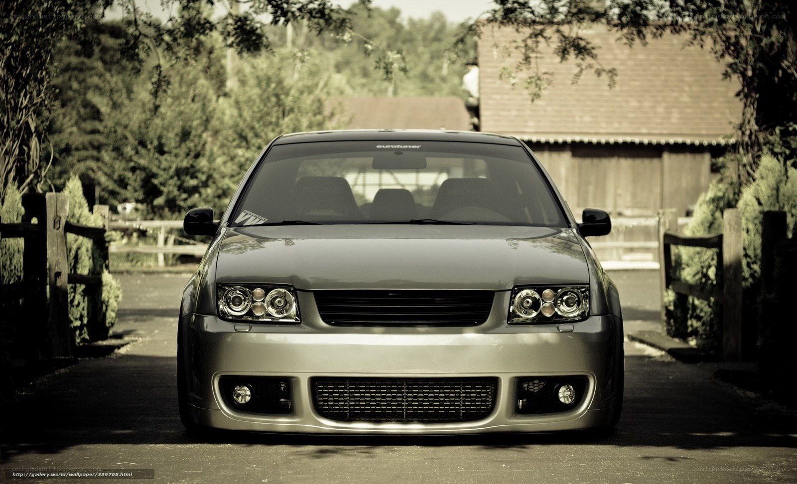 silver car in driveway