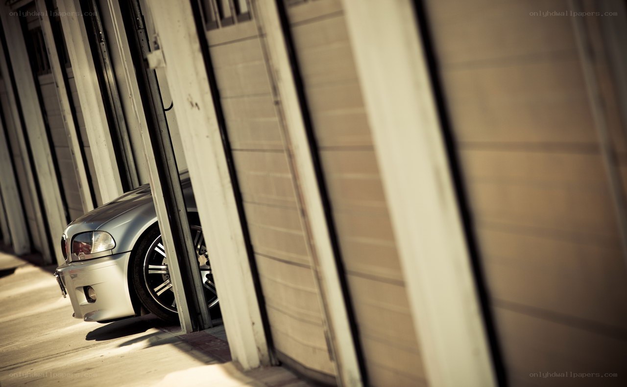 silver car in garage